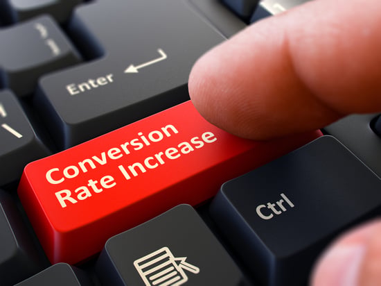 Conversion Rate Increase Red Button - Finger Pushing Button of Black Computer Keyboard