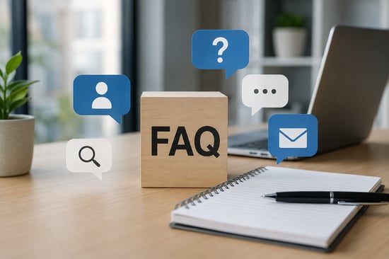 FAQ block surrounded by question, message, email, user, and search icons on a modern office desk.