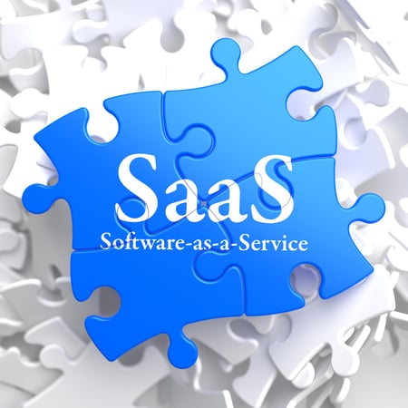 SAAS - Software-as-a-Service - Written on Blue Puzzle Pieces. Information Technology Concept. 3D Render.-1